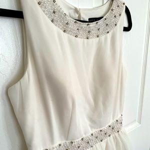 White dress perfect for engagement pictures or homecoming.